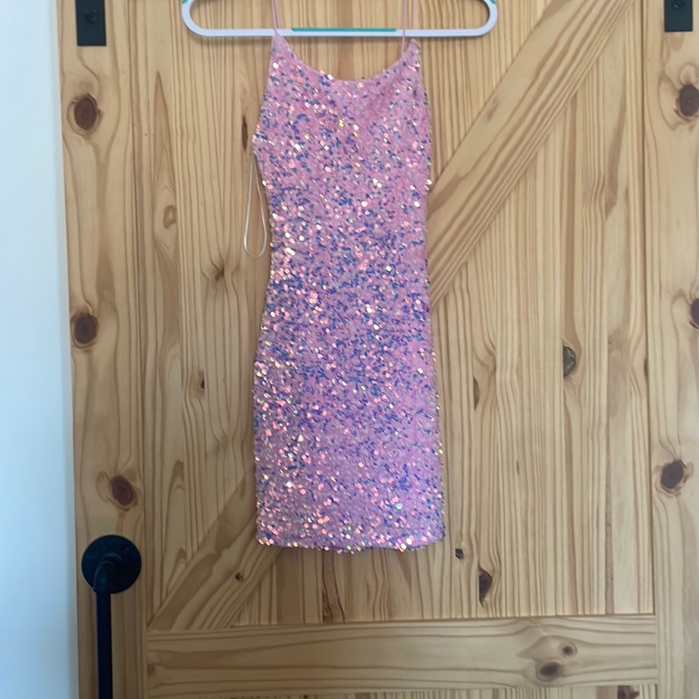 Short homecoming dress. Pink but can look like it has blue.